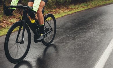 Cyclist training outdoors on a rainy day
